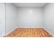 This bedroom features new paint and beautifully refinished hardwood flooring at 9526 Burrwood Ct, Indianapolis, IN 46235