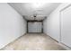 Spacious one car garage with automatic door and access to the home at 9526 Burrwood Ct, Indianapolis, IN 46235