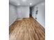 Spacious living room featuring hardwood floors and neutral paint at 9526 Burrwood Ct, Indianapolis, IN 46235