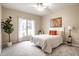 Cozy bedroom with a large window, plush carpet, and charming decor at 9678 Winter Way, Zionsville, IN 46077
