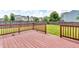 Wood deck overlooking fenced backyard, showcasing outdoor living at 10187 Yosemite Ln, Indianapolis, IN 46234