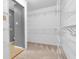 Walk-in closet with ample shelving and storage options at 10187 Yosemite Ln, Indianapolis, IN 46234