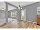 Bright dining area with vinyl floors, neutral paint, and abundant natural light at 10187 Yosemite Ln, Indianapolis, IN 46234