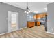 Cozy kitchen features wood cabinets, stainless steel appliances, and a door leading to the outside at 10187 Yosemite Ln, Indianapolis, IN 46234