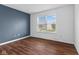 Bedroom featuring a large window with natural light at 10427 Apple Creek Dr, Indianapolis, IN 46235