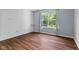 Bedroom with a window view of mature trees, providing lots of natural light at 10427 Apple Creek Dr, Indianapolis, IN 46235