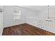 Bright landing area featuring laminate flooring and natural light at 10427 Apple Creek Dr, Indianapolis, IN 46235