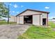Large open barn with tractor and other farming implements inside at 10965 W Base Line Rd, Jamestown, IN 46147