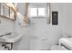Small laundry room with white walls, basic fixtures and a washer/dryer unit at 10965 W Base Line Rd, Jamestown, IN 46147