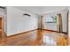 Spacious living room with hardwood floors, natural light, and a view of the outdoors at 10965 W Base Line Rd, Jamestown, IN 46147