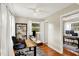 Comfortable office featuring hardwood floors, lots of natural light, and built-in storage at 12606 Markay Dr, Fishers, IN 46038