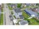 This is an aerial view of a two-story home and its backyard, including a pergola and patio with a nice lawn at 134 N Elder Ave, Indianapolis, IN 46222