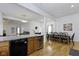 Open concept kitchen with granite countertops and a wine cooler at 134 N Elder Ave, Indianapolis, IN 46222