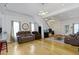 Spacious living room features hardwood floors, recessed lighting, and comfortable seating at 134 N Elder Ave, Indianapolis, IN 46222