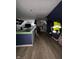 Spacious attic with hardwood flooring; ready to be customized for various uses at 1354 Edgemont Ave, Indianapolis, IN 46208