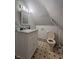 Bathroom features a single sink vanity with white cabinets and neutral colored walls at 1354 Edgemont Ave, Indianapolis, IN 46208