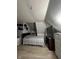 Cozy bedroom with sloped ceilings and ample storage at 1354 Edgemont Ave, Indianapolis, IN 46208