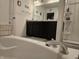 Well-lit bathroom with a double sink vanity, a luxurious bathtub, and a walk-in shower at 1439 Silver Pine Ln, Sheridan, IN 46069