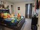 Cozy bedroom with a comfortable bed and large window providing plenty of natural light at 1439 Silver Pine Ln, Sheridan, IN 46069