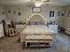 Spacious bedroom features elegant furnishings, a cozy seating area, and carpeted floors at 1439 Silver Pine Ln, Sheridan, IN 46069