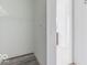 Walk-in closet with wire shelving and modern gray floors at 15946 Meadow Frost Ct, Fishers, IN 46037