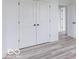 Closet with double doors leading to a hallway at 15946 Meadow Frost Ct, Fishers, IN 46037