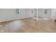 Large basement featuring vinyl flooring, bright windows, and support columns at 1805 Center Valley Rd, Martinsville, IN 46151