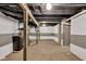 Unfinished basement offering potential for customization, featuring exposed beams at 1805 Center Valley Rd, Martinsville, IN 46151