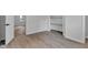 Bedroom featuring vinyl floors, built in shelves, and an open doorway at 1805 Center Valley Rd, Martinsville, IN 46151