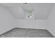 Inviting bedroom showcasing carpet, a window with backyard views, and ample space at 1805 Center Valley Rd, Martinsville, IN 46151