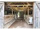 Interior of the barn featuring multiple horse stalls and an unfinished ceiling structure at 1805 Center Valley Rd, Martinsville, IN 46151