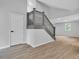 A staircase with carpeted steps and gray painted railings is located at the front of the home at 1805 Center Valley Rd, Martinsville, IN 46151