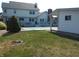 Backyard featuring a swimming pool, shed, deck, mature trees and landscaping at 2020 N Hickory Blvd, Greenfield, IN 46140