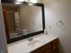 Bathroom featuring a vanity with sink, mirror, and a view into the tub and shower at 2020 N Hickory Blvd, Greenfield, IN 46140