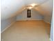 Bonus room showing carpet floors and interesting architecture and lighting at 2020 N Hickory Blvd, Greenfield, IN 46140