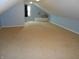 Large bonus room featuring carpeted floors, sloped ceilings, window, and an air conditioner at 2020 N Hickory Blvd, Greenfield, IN 46140