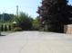 Wide driveway lined with decorative lighting and landscaping, offering ample parking space at 2020 N Hickory Blvd, Greenfield, IN 46140
