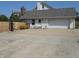 Attached garage with a basketball hoop and a well-maintained driveway at 2020 N Hickory Blvd, Greenfield, IN 46140