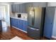 Kitchen with stainless steel appliances, ample cabinet space, and granite countertops at 2020 N Hickory Blvd, Greenfield, IN 46140