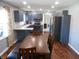 Eat-in kitchen featuring stainless steel appliances, stylish cabinets, hardwood floors, and ample natural light at 2020 N Hickory Blvd, Greenfield, IN 46140