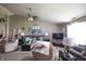 Inviting living room with plush seating, stylish decor, and abundant natural light creating a warm atmosphere at 2402 Foxtail Dr, Plainfield, IN 46168