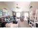 Spacious living room with comfortable seating, vaulted ceilings, and natural light, ideal for relaxation at 2402 Foxtail Dr, Plainfield, IN 46168