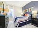Stylish bedroom features modern decor, natural light, and a comfortable queen-sized bed at 278 Evening Bay Ct, Pendleton, IN 46064