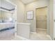 Hallway featuring access to the main bedroom with a large window and a walk-in closet at 278 Evening Bay Ct, Pendleton, IN 46064