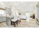 Open-concept kitchen flows into the living area, perfect for modern living and entertaining guests at 278 Evening Bay Ct, Pendleton, IN 46064