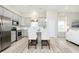 Modern kitchen with stainless steel appliances, a center island, and ample cabinet space at 278 Evening Bay Ct, Pendleton, IN 46064