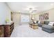 Relaxing living room with a cozy gray sectional sofa, decorative trunk and modern accents at 278 Evening Bay Ct, Pendleton, IN 46064