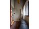 Inviting hallway featuring a leather bench, and elegant decor creates a welcoming entrance at 3959 Central Ave, Indianapolis, IN 46205