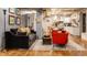 Open-concept living room with hardwood floors, neutral walls, and comfortable seating at 3959 Central Ave, Indianapolis, IN 46205
