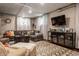 Cozy basement living room with plush seating, media console, and stylish decor at 3959 Central Ave, Indianapolis, IN 46205